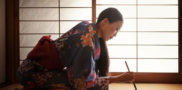Japanese woman doing calligraphy