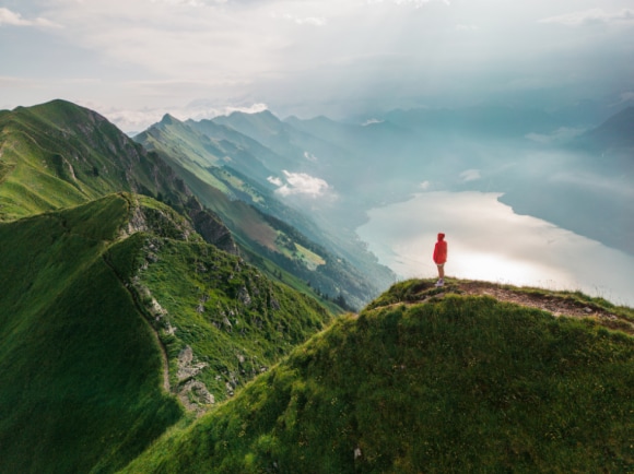 Woman looking at hills and mountains
