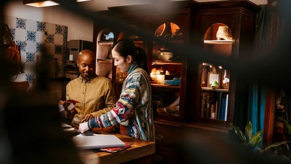 Two women working together.
