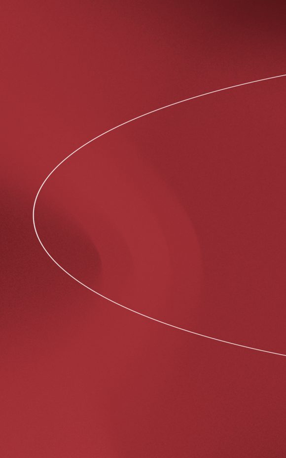 A client and UBS Advisor walking and having a conversation next to the water.