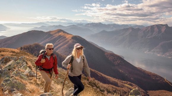 Couple hiking on mountain ridge