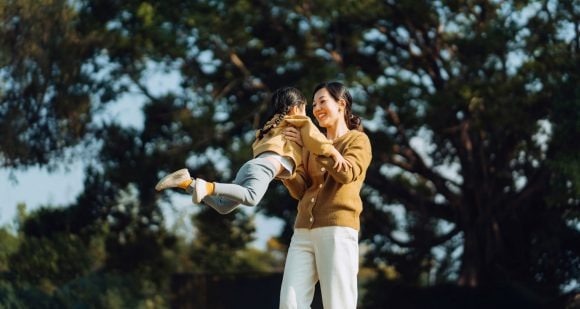 Mother playing with daughter
