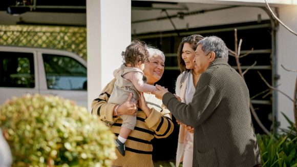 Grandparents meeting with daughter and grandchild