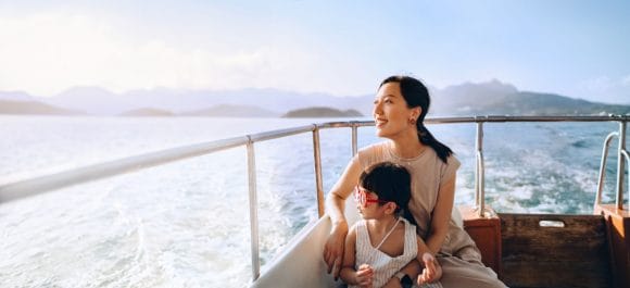 Mother and daughter on boat trip