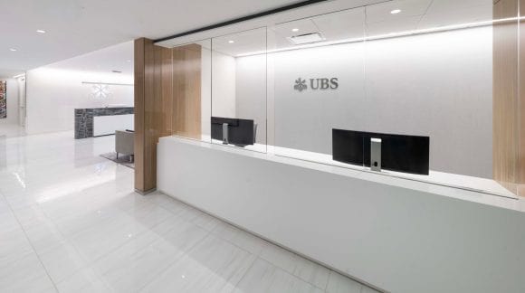 The UBS office reception with UBS logo on wall