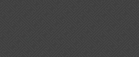 Deep gray geometrical pattern fashioned after the shape of keys
