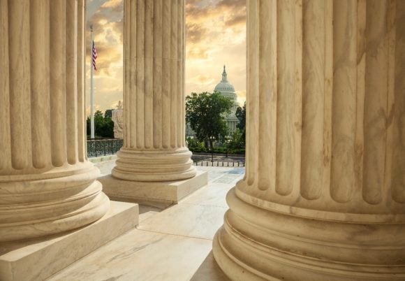 US Congress Building in the background of Roman columns