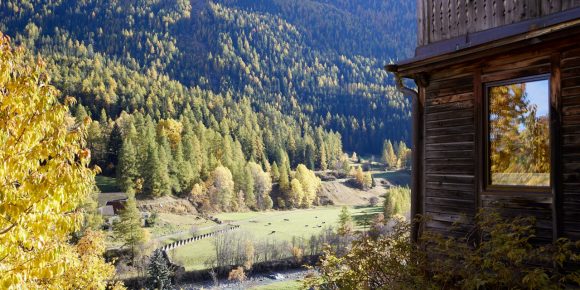 Outside view of home with view of valley