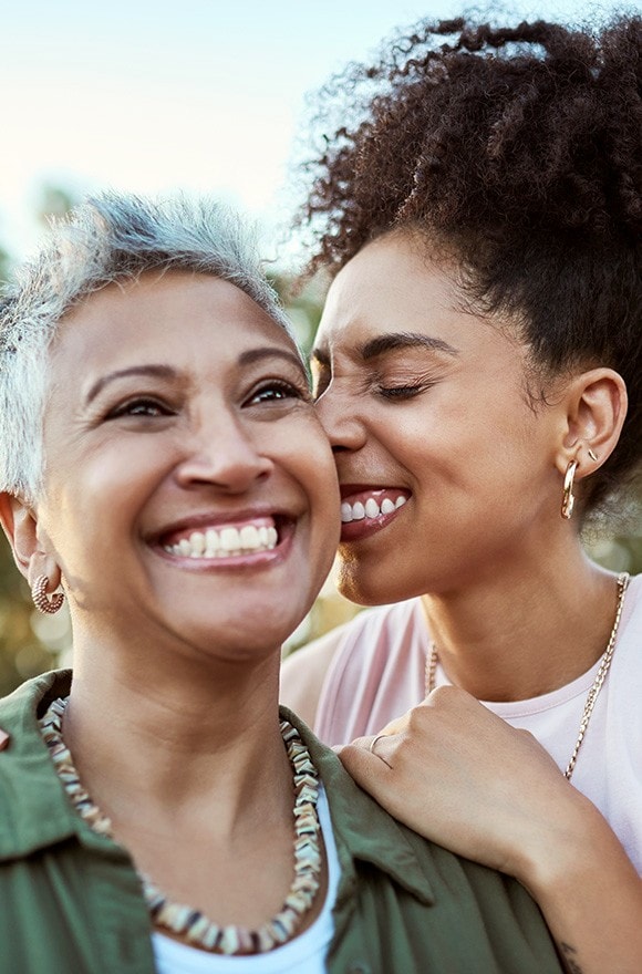 Close-up of smiling, happy two women.