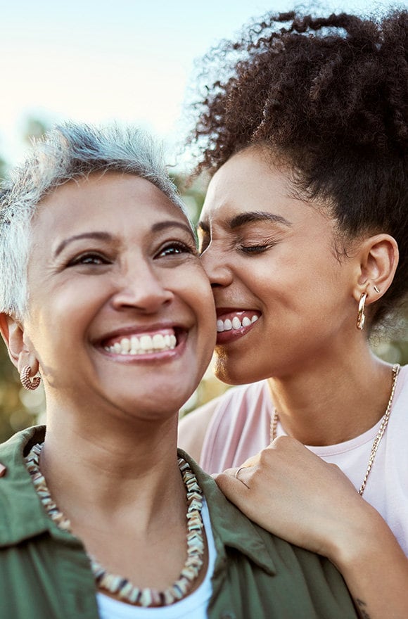 Close-up of smiling, happy two women.