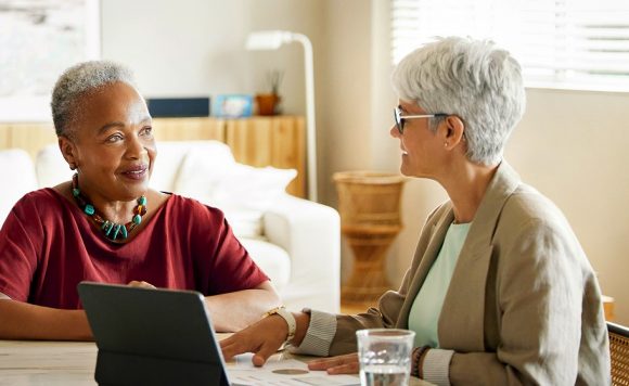 Smiling elderly woman living room