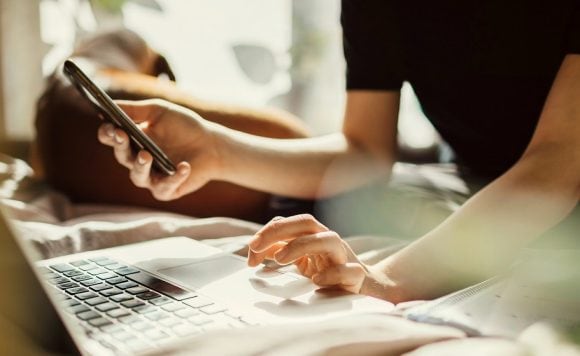 Detail of laptop and cell phone