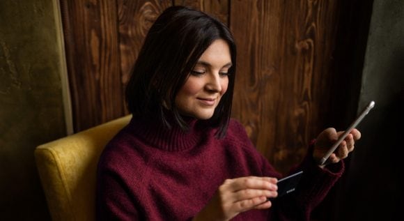 Woman viewing cell phone