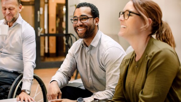 Diverse group of smiling employees.