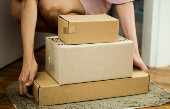 Photograph: Stack of three cardboard delivery boxes