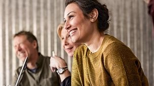 Participant engagement and retirement readiness-business people meeting