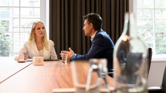 Two people having meeting at UBS headquarter Bahnhofstrasse 45, Zurich
