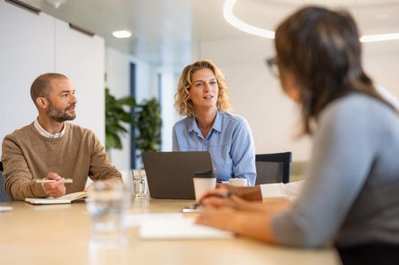 Employees having meeting