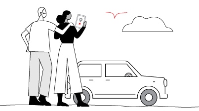 man and woman standing infront of car