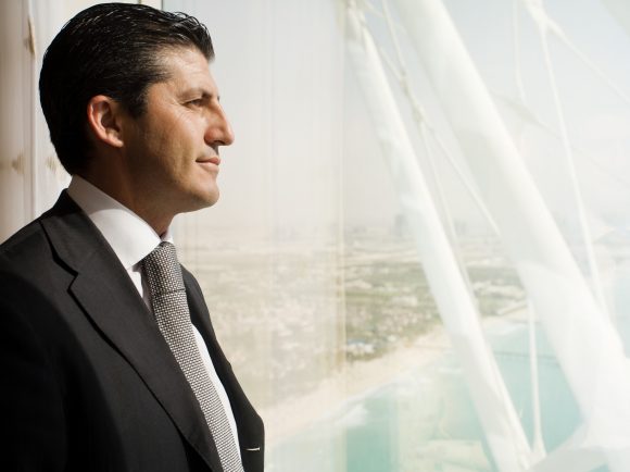 Businessman looking out of window