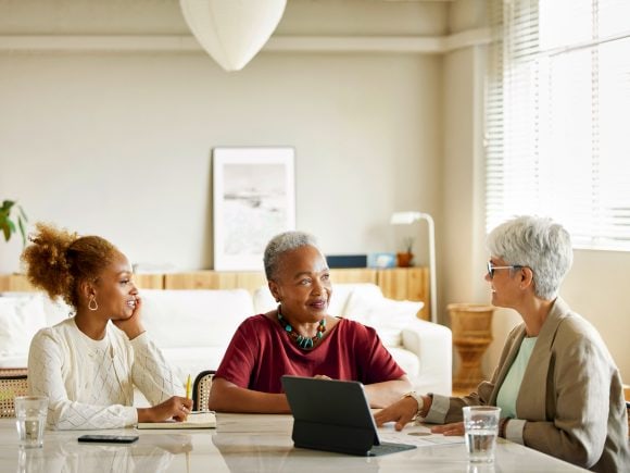 Senior woman reflecting on her beautifully furnished home