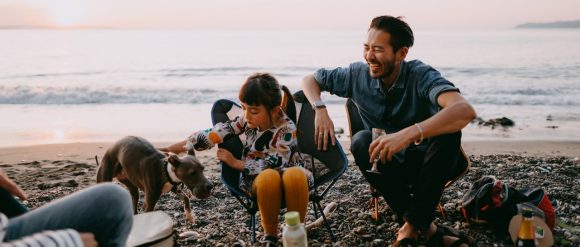 Father and daugher on beach