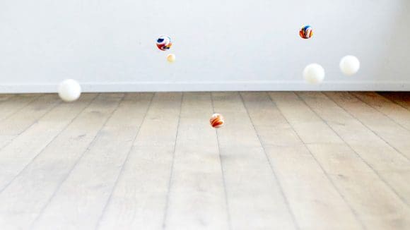 marbles bouncing on floor