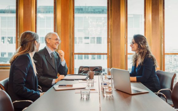 Senior man talking to advisor