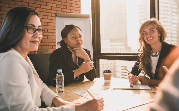 Group of diverse businesswomen leaders in meeting room at the office