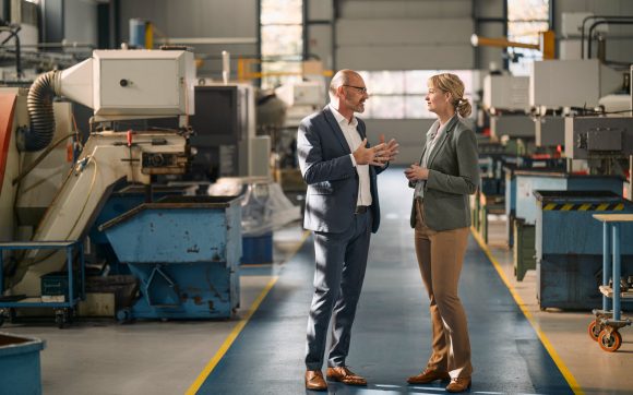 Two business people having conversation