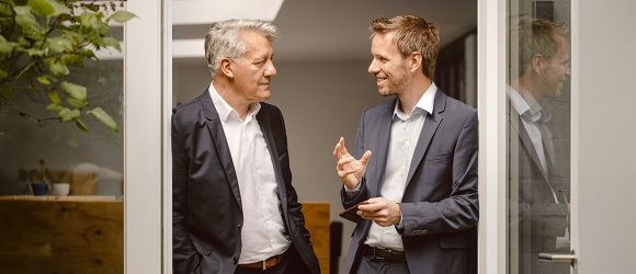 Two businessmen talking