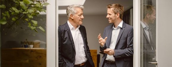 Two businessmen talking