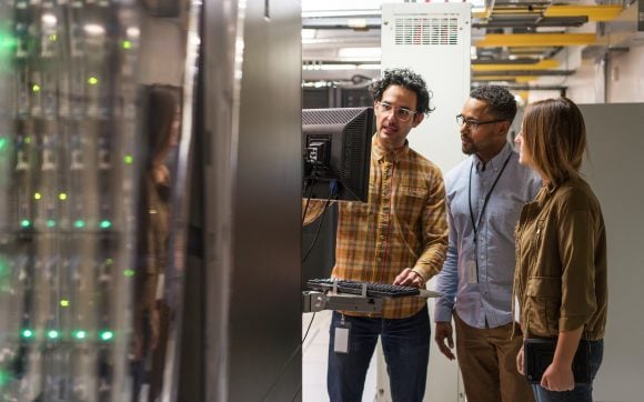 Technicians in server room