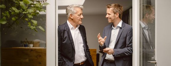 Two businessmen talking