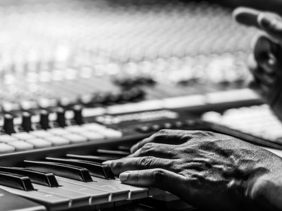 hands on piano keys
