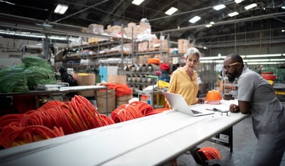 Business owners at factory