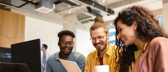 Three colleagues having meeting