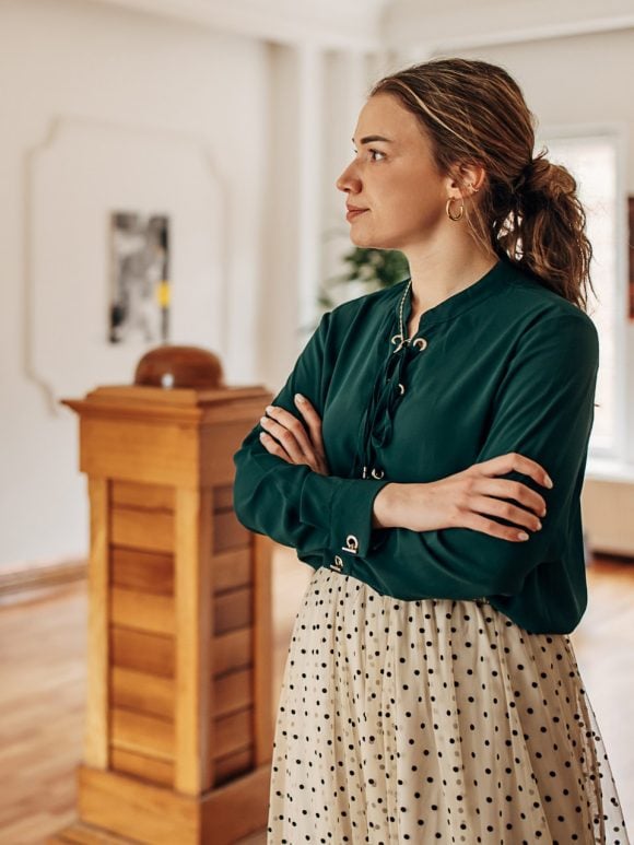 Female executive looking at artwork