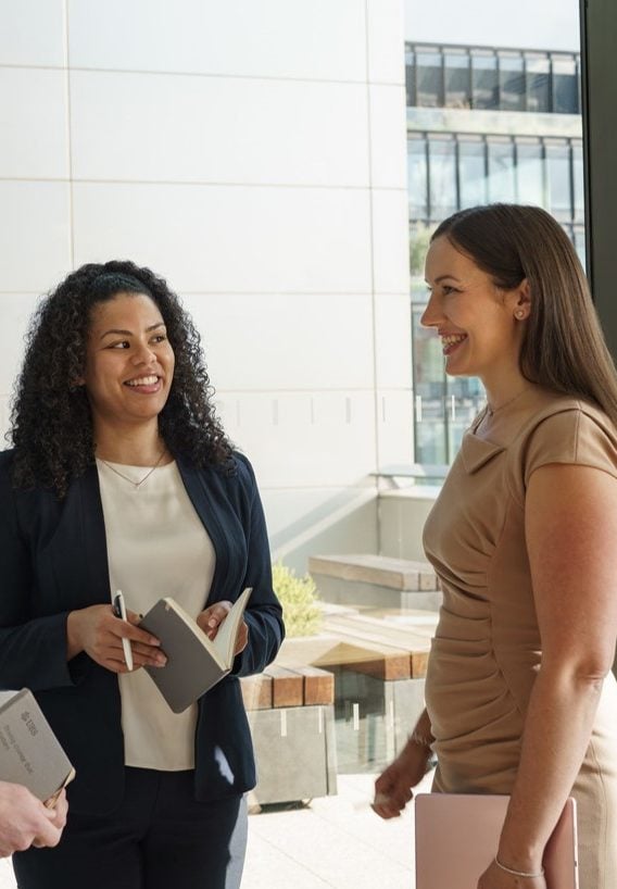 Three friends discussing