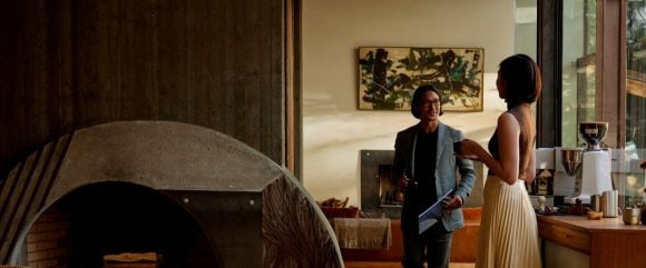 Affluent man and woman in modern home